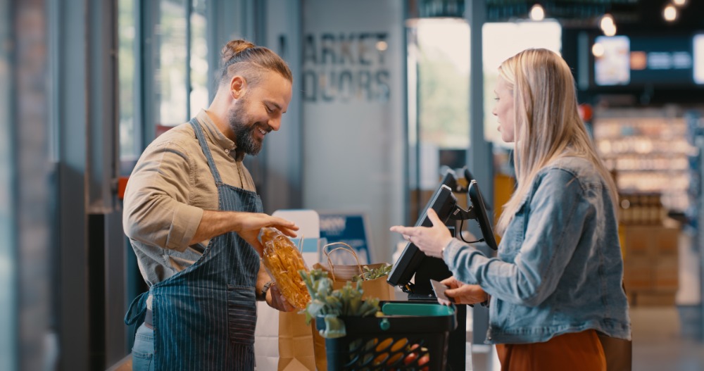 woman buying coffee