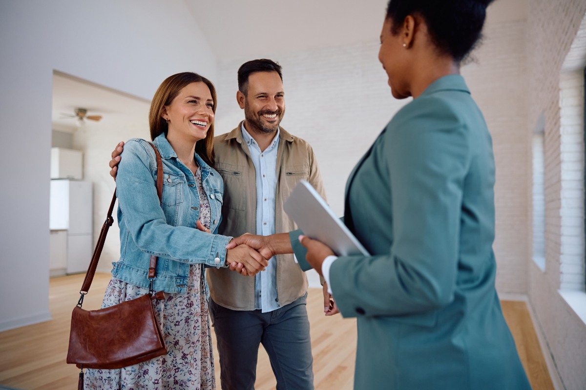couple having a deal on a real estate agent